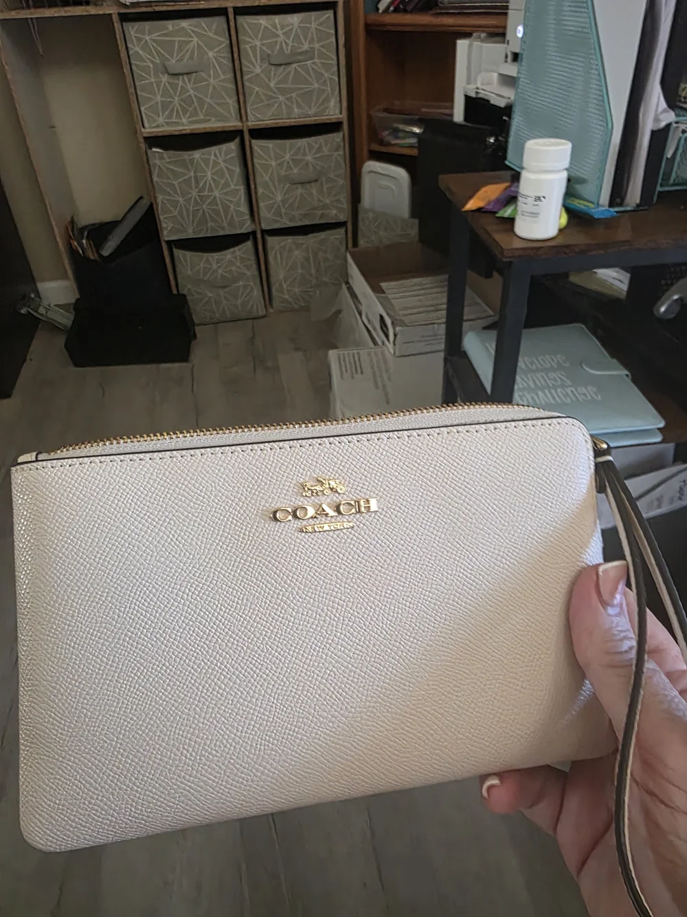 Coach Cream Wristlet Clutch with Gold Logo